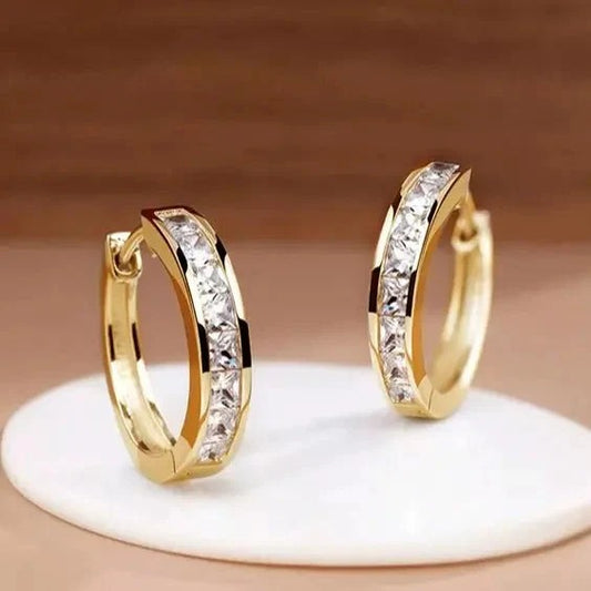 ELEGANTE AROS DORADOS Y CON CRISTALES